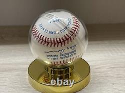 1990 official American League baseball display holder, with official baseball