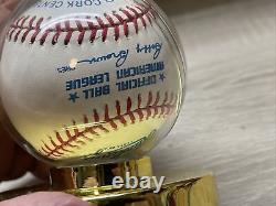 1990 official American League baseball display holder, with official baseball